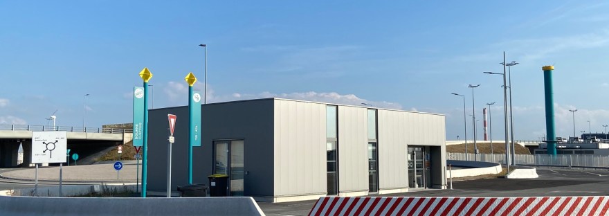 photo of a grey single storey building at Calais ferry port